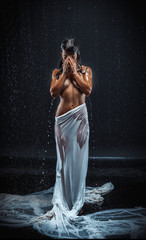 Fototapety  beautiful nude woman in aqua in the rain