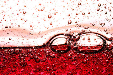 Abstract texture of bright red bubbles closeup