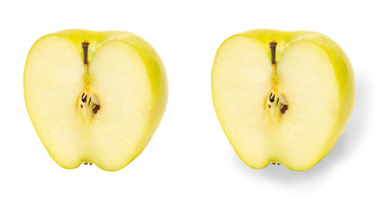Green Apple cut in half. Isolated on white background