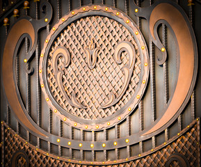 Decorative parts of metal gates, elements of hand forging