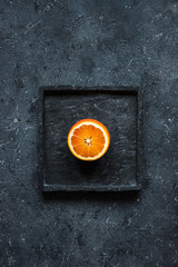 Blood orange fruit on gray background top view.