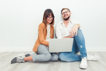 Two freelancers working at office