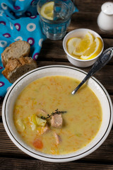 Traditional Finnish salmon cream soup Lohikeitto with potatoes and leeks