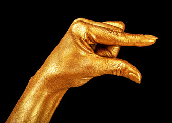 Hand gesture. Hand in gold paint, shiny, metallic. Isolated on black background.