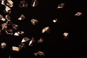 Shiny background. Background of gold particles. New Year, Christmas background for your design.