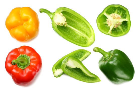green sweet bell pepper with slices isolated on white background top view