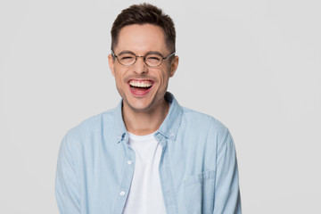 Funny guy nerd wearing glasses laughing looking at camera