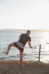 Fencing on the beach from the rope , fencing between the sea and sand. Violation on the beach..