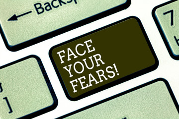 Word writing text Face Your Fears. Business concept for Have the courage to overcome anxiety be brave fearless Keyboard key Intention to create computer message pressing keypad idea