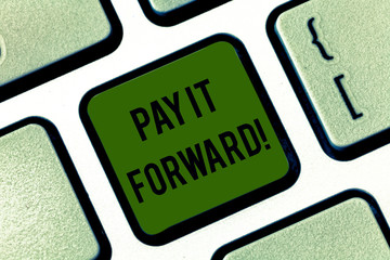 Word writing text Pay It Forward. Business concept for Do the payment a certain amount of time after purchasing Keyboard key Intention to create computer message pressing keypad idea