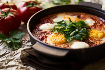 Pan of Fried Eggs with Tomatoes, Sweet Peppers and Coriander