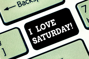 Handwriting text writing I Love Saturday. Concept meaning To have affection for the weekend happy excited relax Keyboard key Intention to create computer message pressing keypad idea
