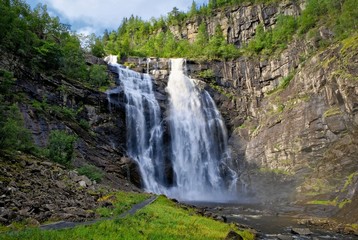 Fototapeta premium Frontal view of the Skjervsfossen in long exposure, seen from the base