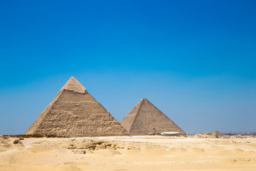 Obraz na płótnie Canvas pyramids with a beautiful sky of Giza in Cairo, Egypt.