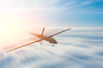 Unmanned military drone uav flight motion blur high speed