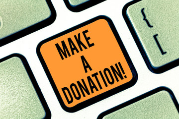 Text sign showing Make A Donation. Conceptual photo Donate giving things not used any more to needed showing Keyboard key Intention to create computer message pressing keypad idea