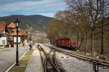 Old railroad station with narrow gauge railway track, popular tourist attraction known as sarganska osmica in Mokra Gora village in Serbia.