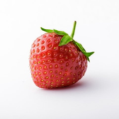Strawberry fresh vibrant color close up isolated on white background on bright light in studio
