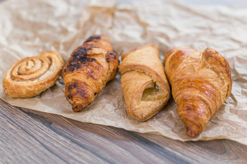 Fresh croissants on paper 