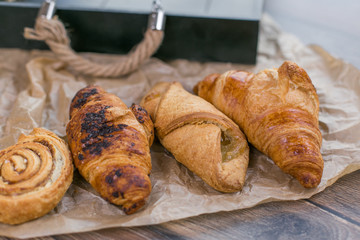 Fresh croissants on paper 