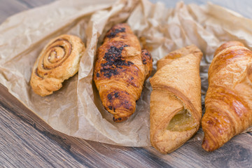 Fresh croissants on paper 