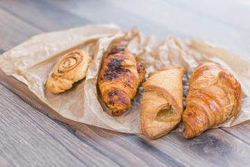 Fresh croissants on paper 