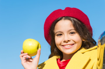 Fototapeta premium Healthy diet. Snack while walk. Kids health and nutrition. Healthy snacking benefits. Snack between lunch and dinner. Having snack. Good nutrition essential good health. Kid girl eat apple fruit