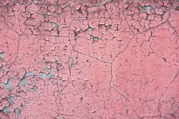 The texture of the concrete wall from which the paint peeled off. Texture of the destroyed concrete wall for design.