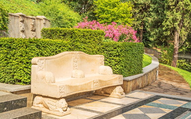 Beautiful stone bench onalley of  seaside park