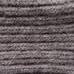 Texture knitted fabric. Facial binding for the product. Textured cotton warm knitted fabric. Texture for designers