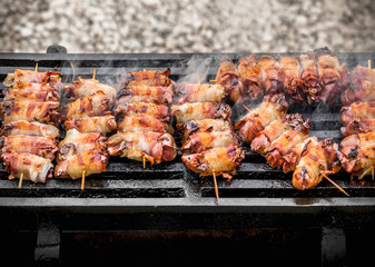 Barbeque outside arrangement grilled pork meat kebabs and smoke