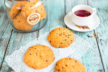 Tasty delicious cookies on wooden background in cafe. Photo for menu