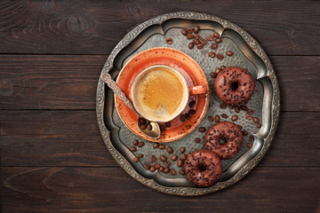 Tasty sweet donuts  and coffee mug