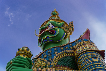 Statue of Giant at Wat Arun. Wat Arun or Temple of the Dawn is one of a famous Buddhist temple in the Bangkok, Thailand