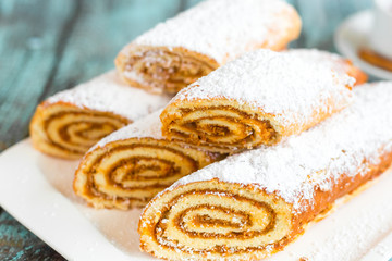 Sweeet tasty baked cakes and cookies on plate. Dessert, sugar, breakfast concept