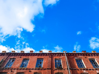 Old architectural plant. Old abandoned red brick factory.Ancient construction.