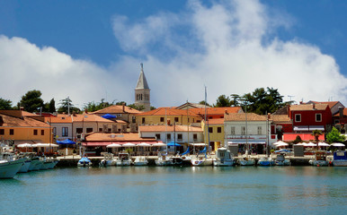 Obraz premium Private boats in the Mediterranean sea near Croatian resort town Novigrad