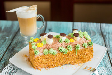 Delicious cake with coffee latte on wooden table