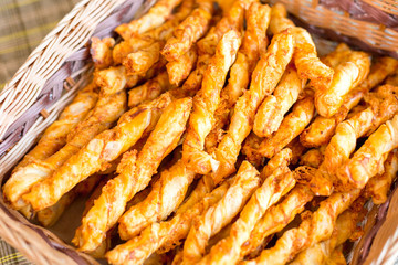 Cheese chips on plate. Baked tasty snack, food photo concept