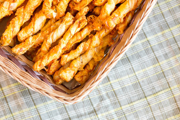 Cheese chips on plate. Baked tasty snack, food photo concept