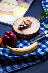 sandwich on a blackboard with a knife cutter