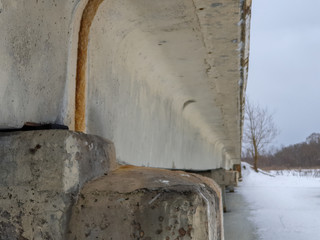 The Bridge concrete across the river close-up. Bridge for pedestrians.