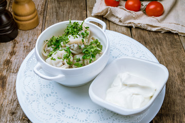 Dumplings with sour cream and herbs