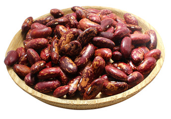 A full wooden plate of bean , isolated on a white background.