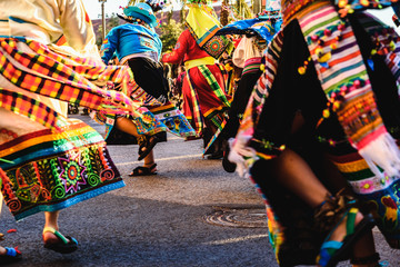 Valencia, Spain - February 16, 2019: Detail of the colorful traditional Bolivian party outfit...