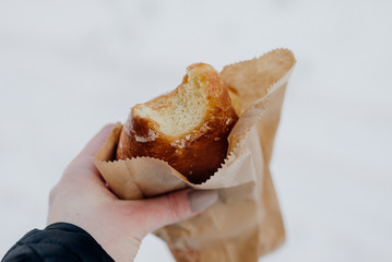 Fresh Doughnut in hand