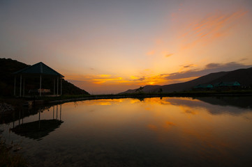 Beautiful clouds flying over the lake near mountains. Evening time shot over the clouds. Azerbaijan. Big Caucasus