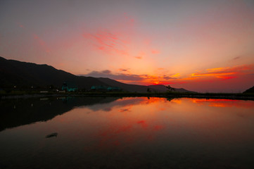 Beautiful clouds flying over the lake near mountains. Evening time shot over the clouds. Azerbaijan. Big Caucasus