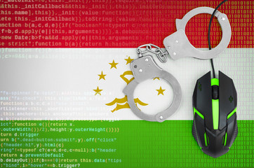Tajikistan flag  and handcuffed computer mouse. Combating computer crime, hackers and piracy