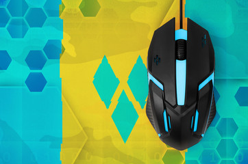 Saint Vincent and the Grenadines flag  and computer mouse. Concept of country representing e-sports...